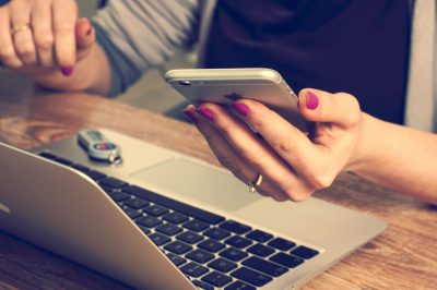 woman holding smart phone