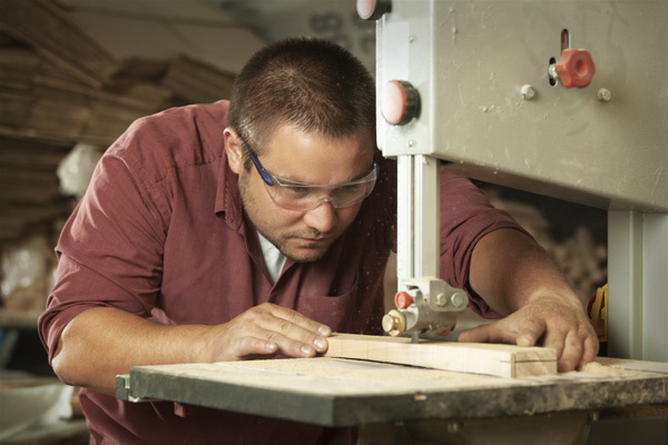 man on bandsaw